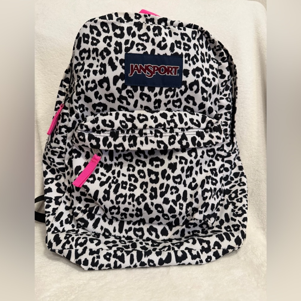 JanSport Leopard Print Backpack in Black, White & Pink